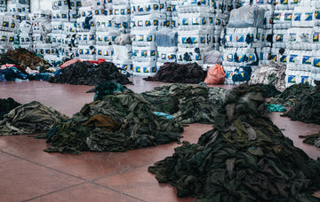 Pile of clothing at Anian factory ready to be recycled
